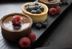Chocolate Mint Tart with Berries and Chocolate-Dipped Mint Leaves