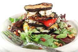 Grilled Vegetable Towers with Wilted Greens and Prosciutto Pine Nut Vinaigrette