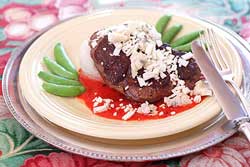 Filets with Gorgonzola on Red Pepper Puree